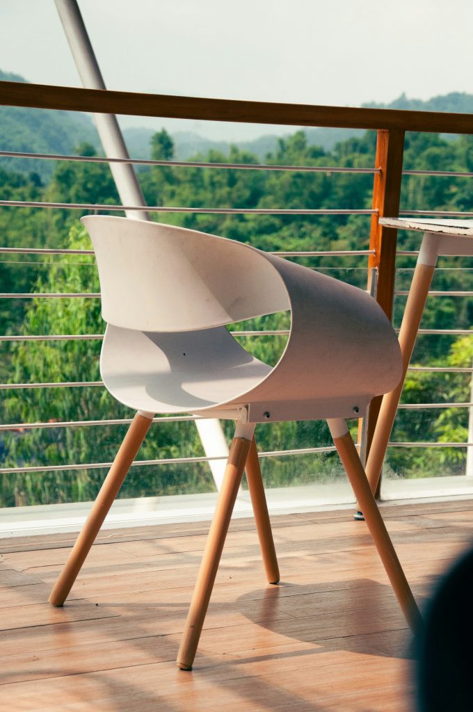 Photo by <a href="https://unsplash.com/@nilepereiraa?utm_content=creditCopyText&utm_medium=referral&utm_source=unsplash">Nile Pereira</a> on <a href="https://unsplash.com/photos/a-white-chair-sitting-on-top-of-a-wooden-floor-kqYHswdIpX4?utm_content=creditCopyText&utm_medium=referral&utm_source=unsplash">Unsplash</a>